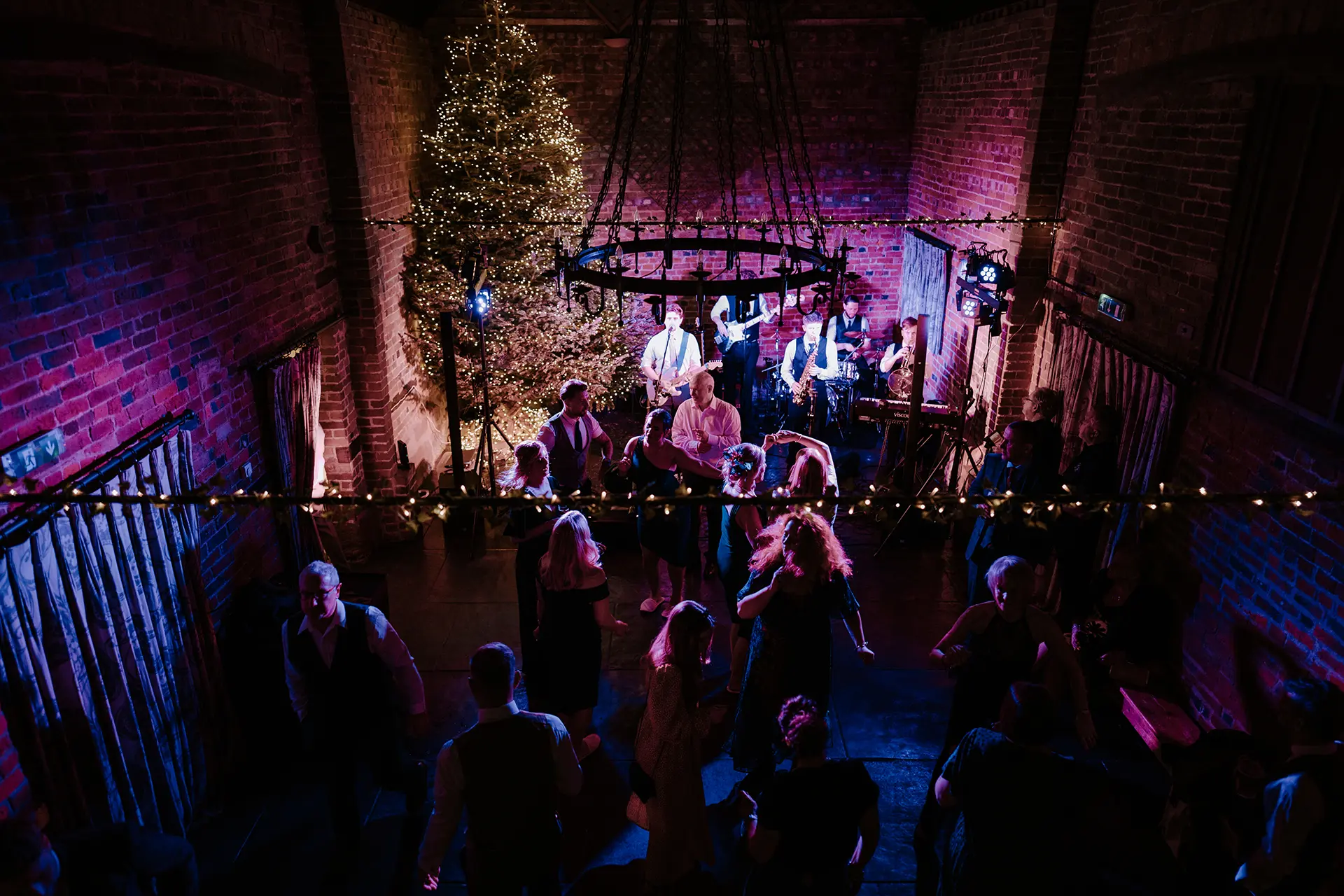 guests dancing in the granary barn